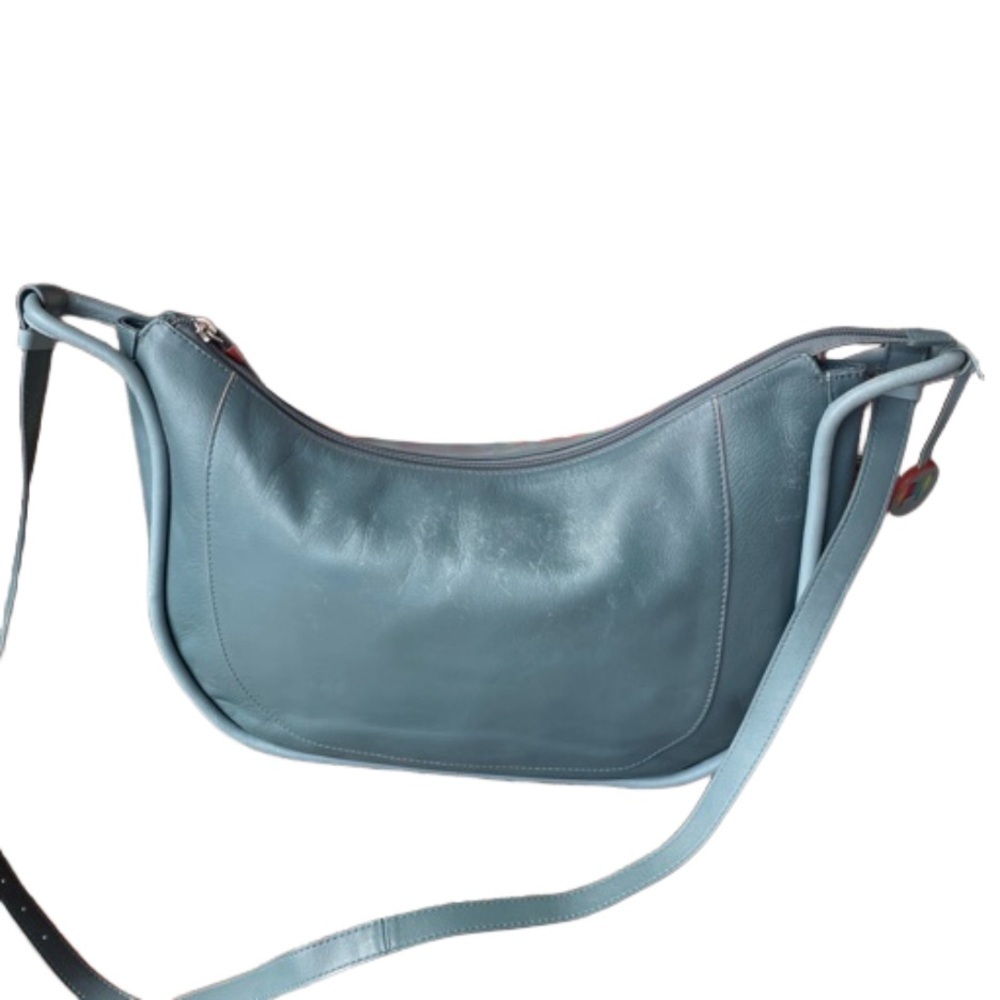Mywalit shoulder bag in dusty blue trimmed with mango details. B6